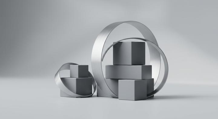 3D render of clean, abstract metal geometries and curves.